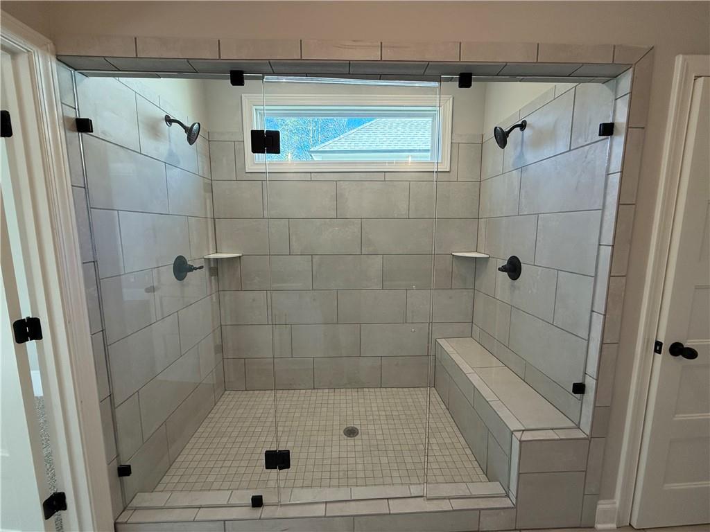 3844 Cheyenne Lane Jefferson, GA 30549 - Photo 24 of 36 a bathroom with a shower