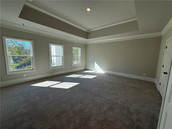 an empty room with a empty space and window