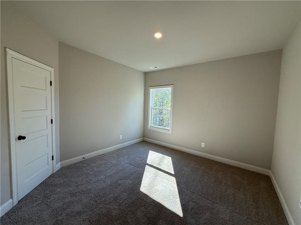3844 Cheyenne Lane Jefferson, GA 30549 - Photo 28 of 36 an empty room with a empty space and window