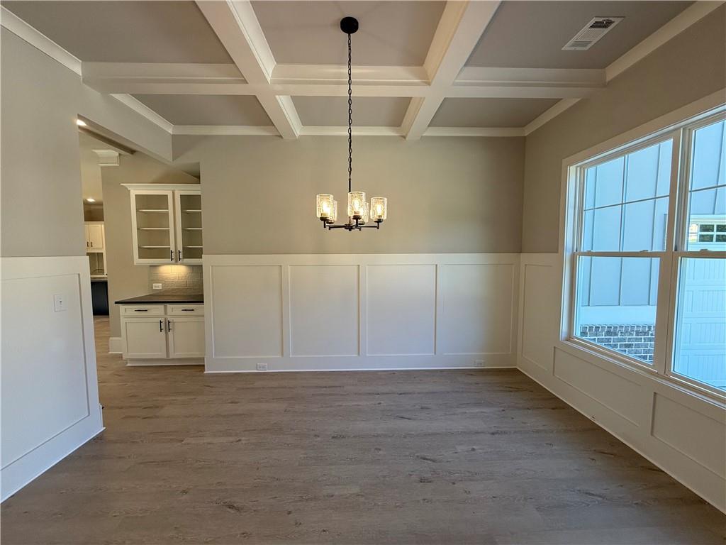 3844 Cheyenne Lane Jefferson, GA 30549 - Photo 4 of 36 a view of an empty room with window and cabinet