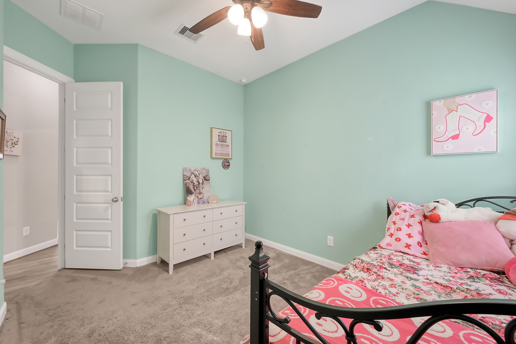 17923 Durango Point Court Tomball, TX 77377 - Photo 29 of 36 The hallway leading to the secondary bedrooms is LVP and all the doors have six panels.