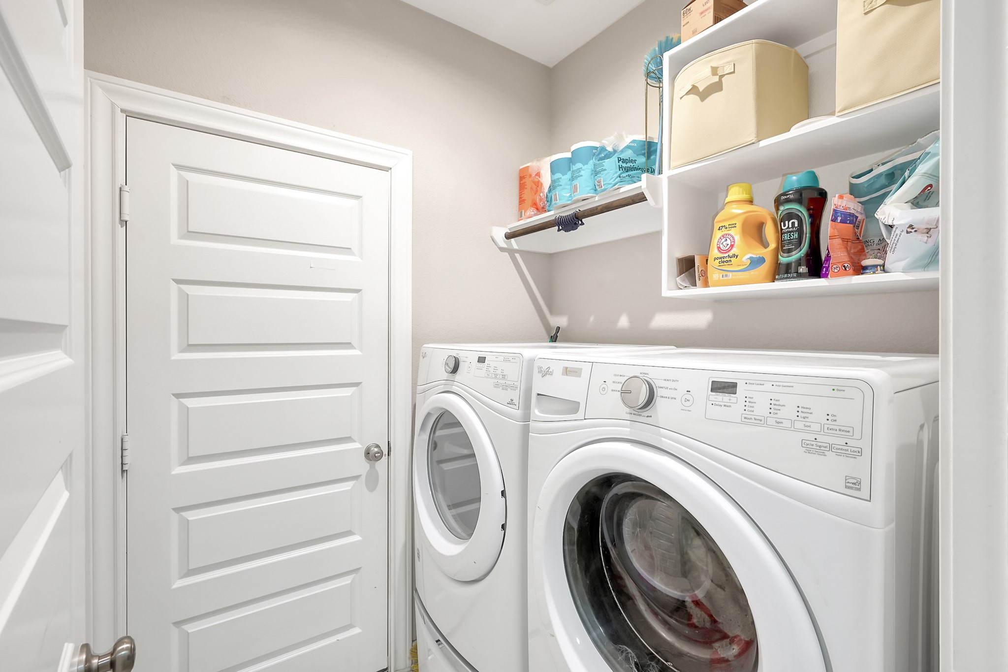 17923 Durango Point Court Tomball, TX 77377 - Photo 33 of 36 The laundry room with overhead storage.