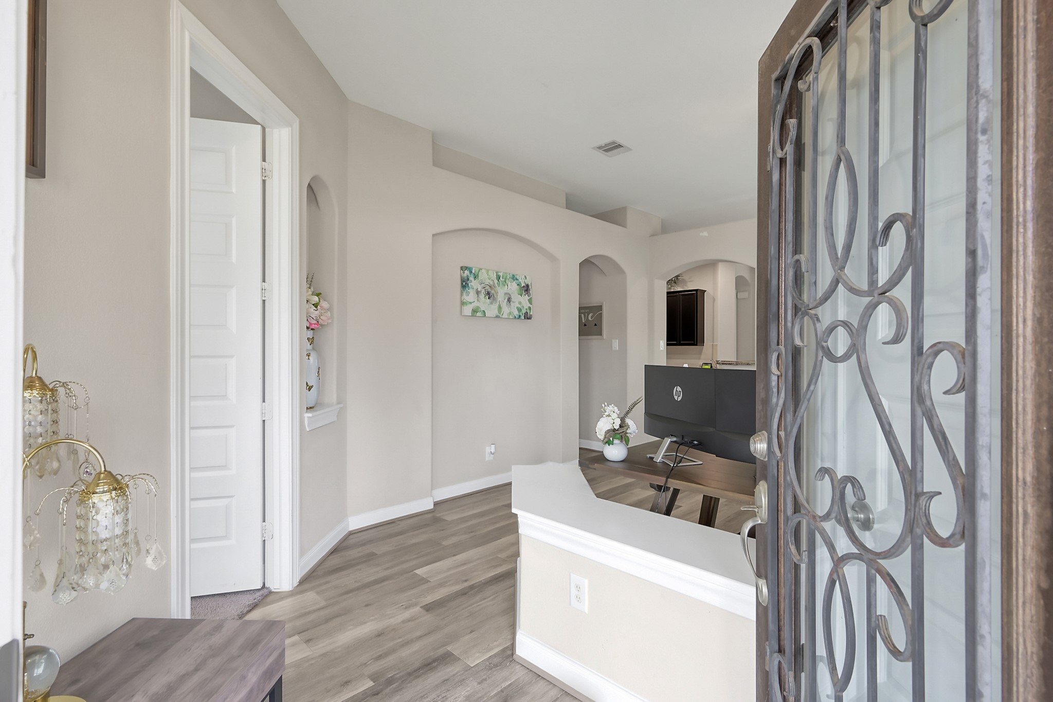 17923 Durango Point Court Tomball, TX 77377 - Photo 4 of 36 As you enter the home you are welcomed with high ceilings, neutral paint and luxury vinyl plank flooring.