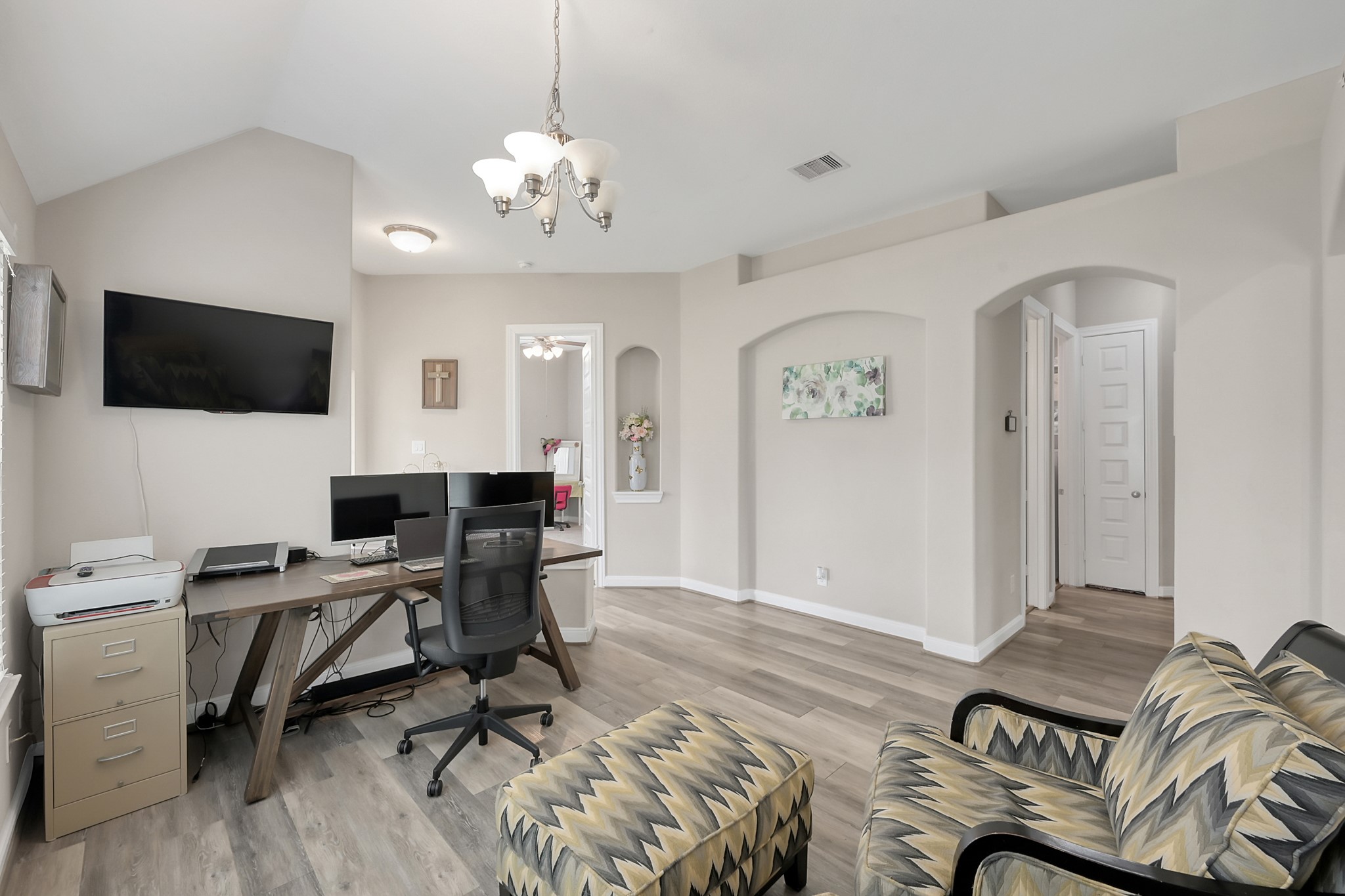 17923 Durango Point Court Tomball, TX 77377 - Photo 7 of 36 Another view of this space with a bedroom off the entry and the hallway leading to the secondary bedrooms.