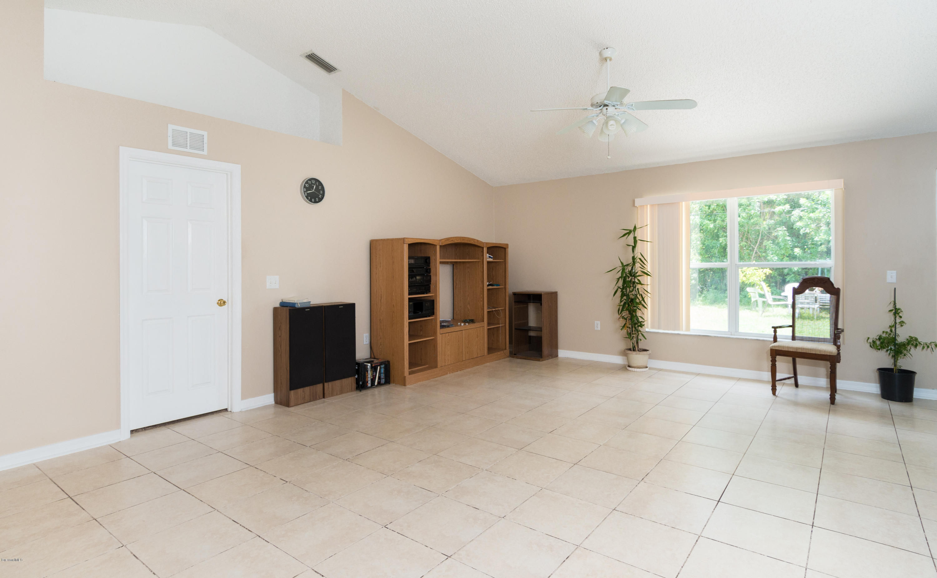 880 Tupelo Road Southwest Palm Bay, FL 32908 - Photo 2 of 15 Family Room View 1