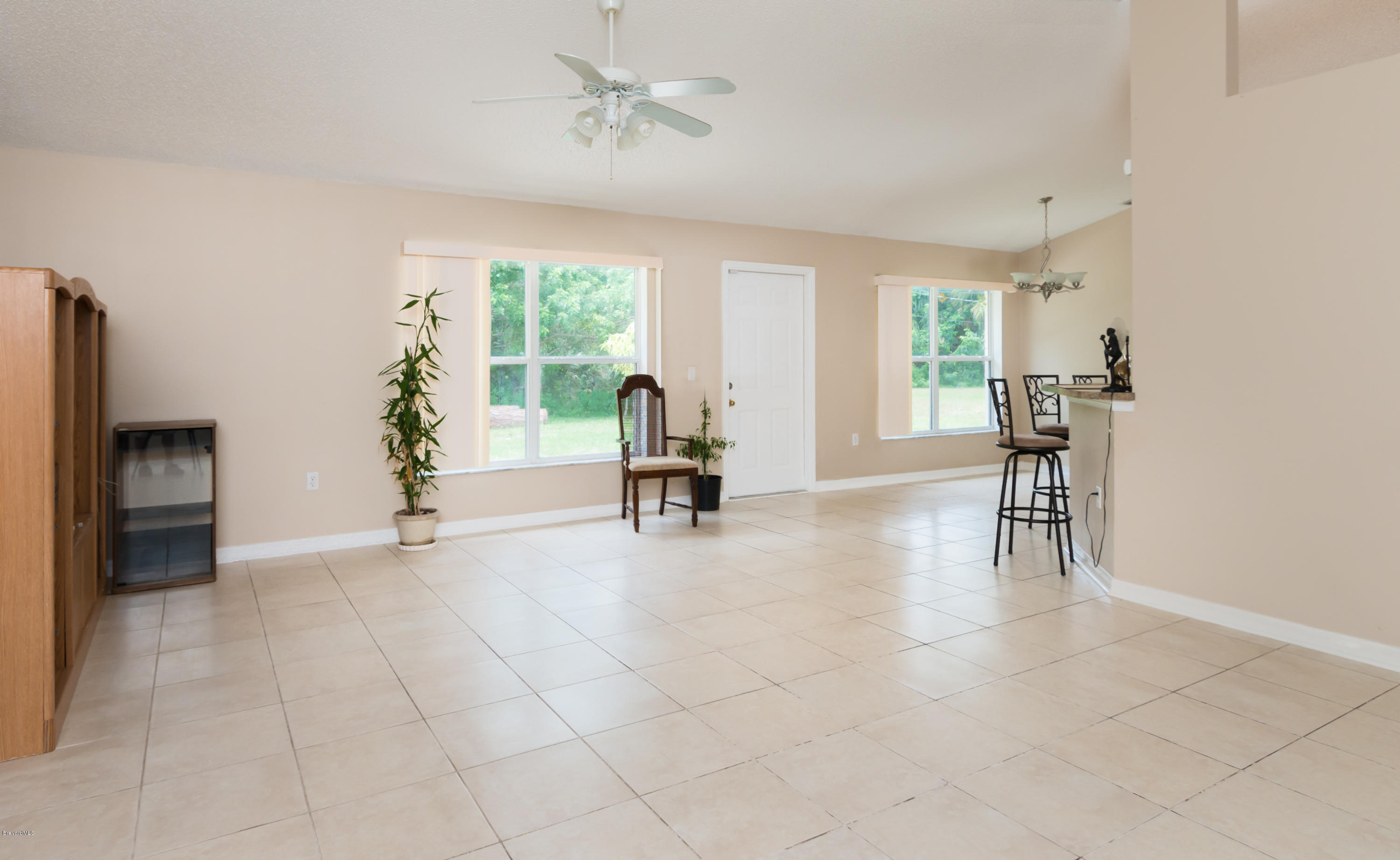 880 Tupelo Road Southwest Palm Bay, FL 32908 - Photo 3 of 15 Family Room View 2