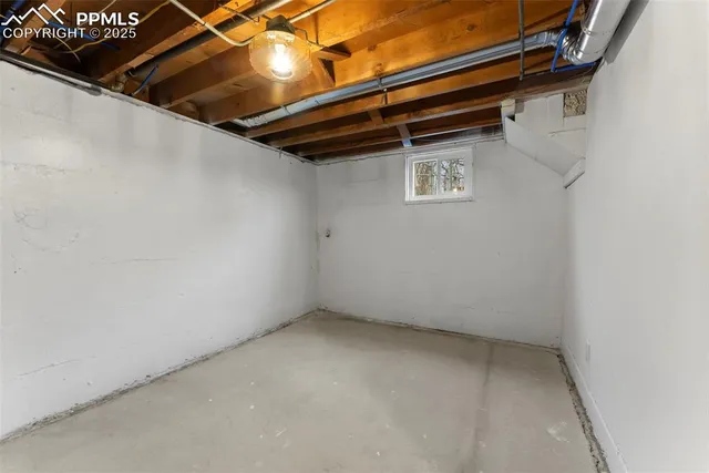 a view of a room with a hallway