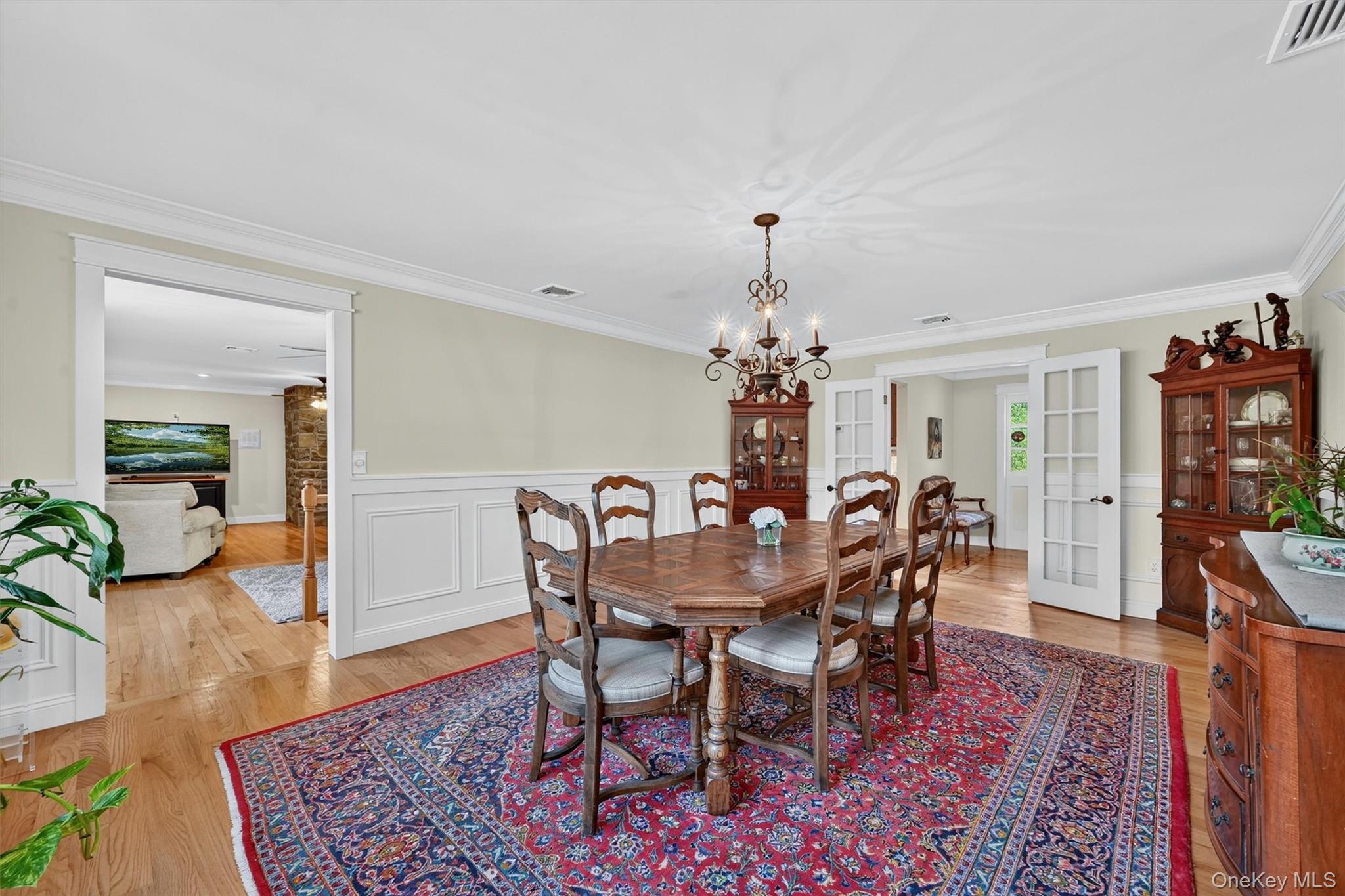 5 Hedges Road Warwick, NY 10990 - Photo 9 of 48 A beautifully detailed dining room connects easily to the family room, creating a comfortable flow for entertaining and everyday living.