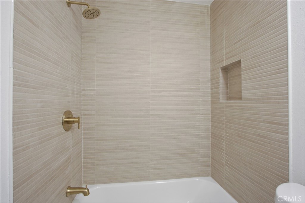4635 Beach Boulevard Buena Park, CA 90621 - Photo 17 of 32 a bathroom with a shower