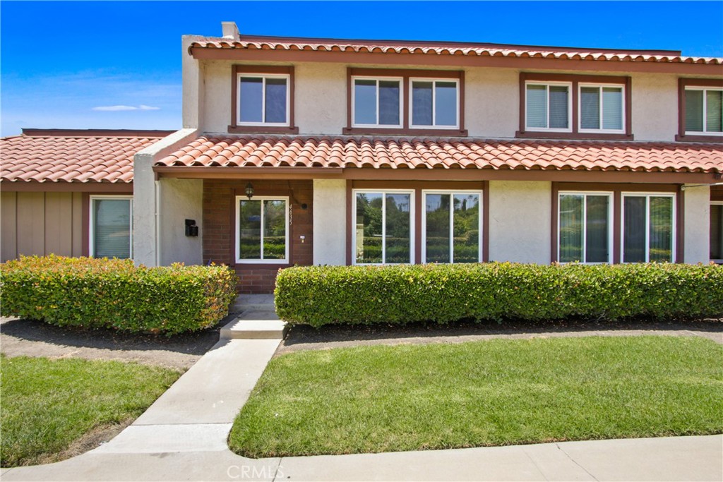 4635 Beach Boulevard Buena Park, CA 90621 - Photo 2 of 32 a front view of a house with a garden
