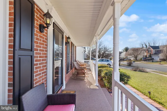 a view of balcony with furniture