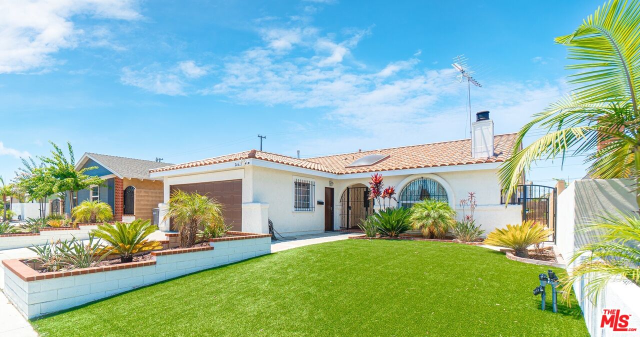 a front view of house with yard