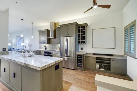 $1,495,000 | 7655 Pebble Creek Circle, Unit 404, Naples, FL 34108
