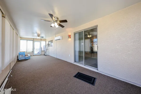 a view of a livingroom with entryway