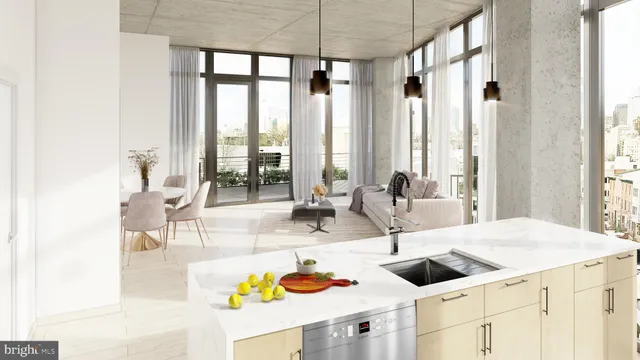 a kitchen with a sink a counter and a view of living room