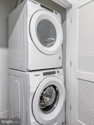 a kitchen with a sink a stove and refrigerator