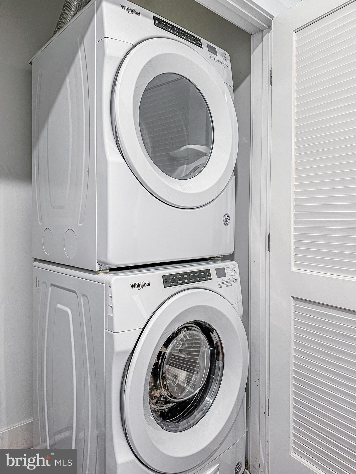 1222 North 2nd Street, Unit 403 Philadelphia, PA 19122 - Photo 26 of 37 a utility room with dryer and washer