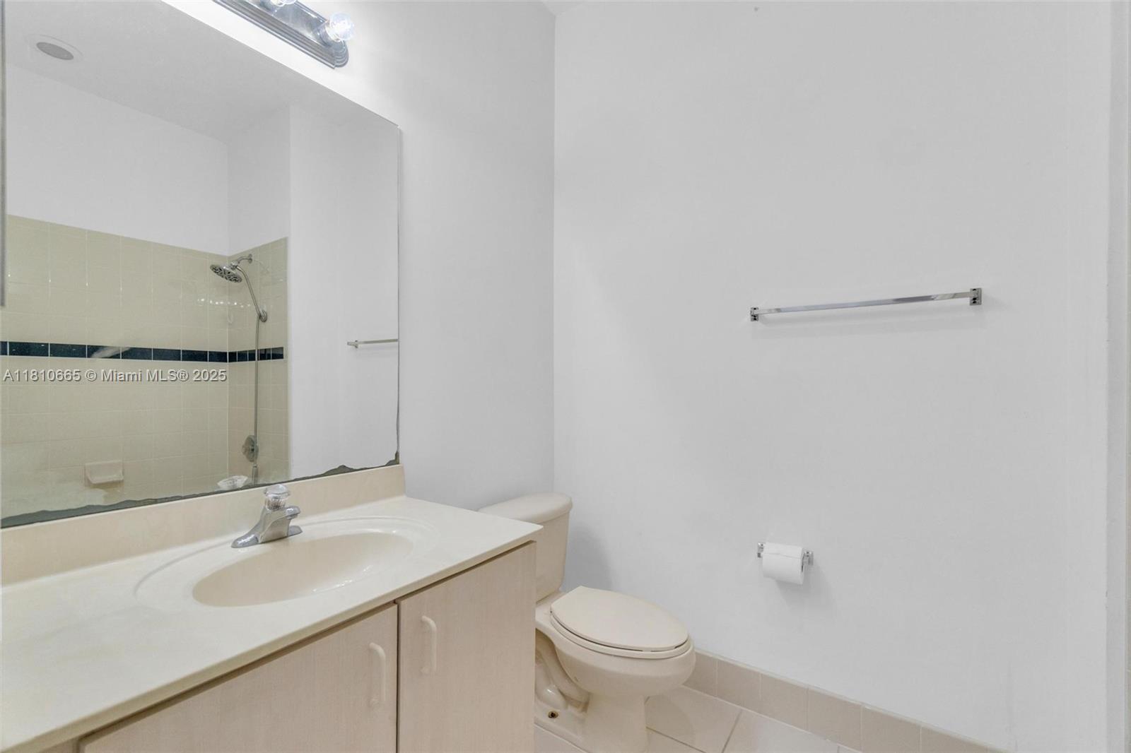 11014 Southwest 237th Lane Homestead, FL 33032 - Photo 33 of 47 a bathroom with a sink and a toilet