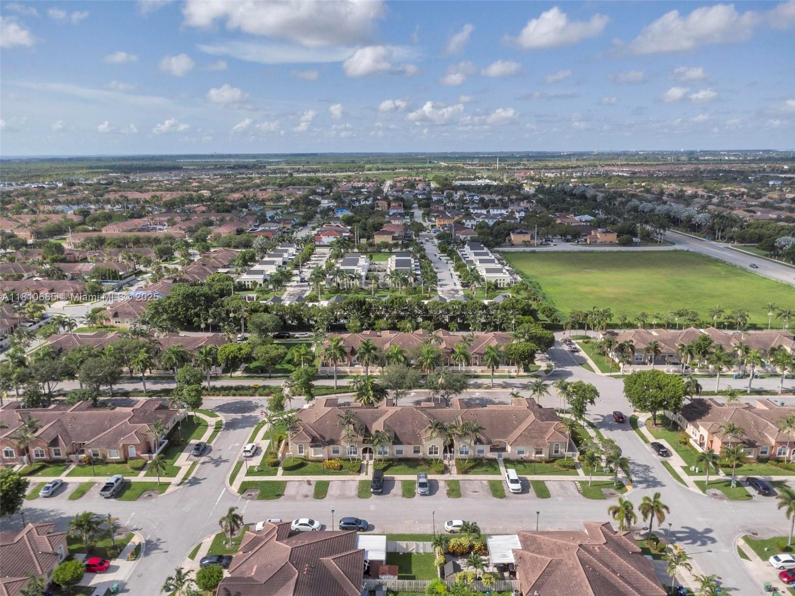 11014 Southwest 237th Lane Homestead, FL 33032 - Photo 44 of 47 an aerial view of a city