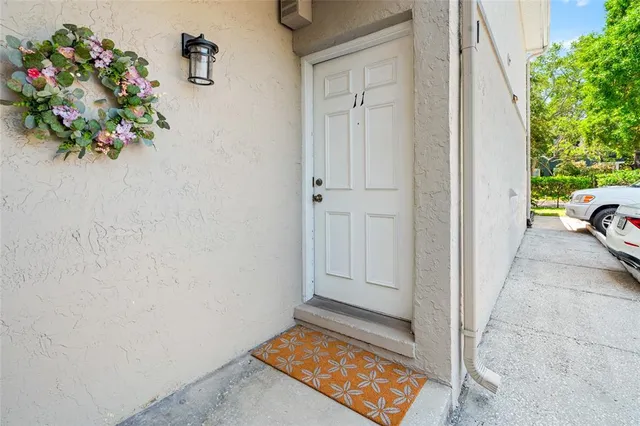 a view of entryway with flowers