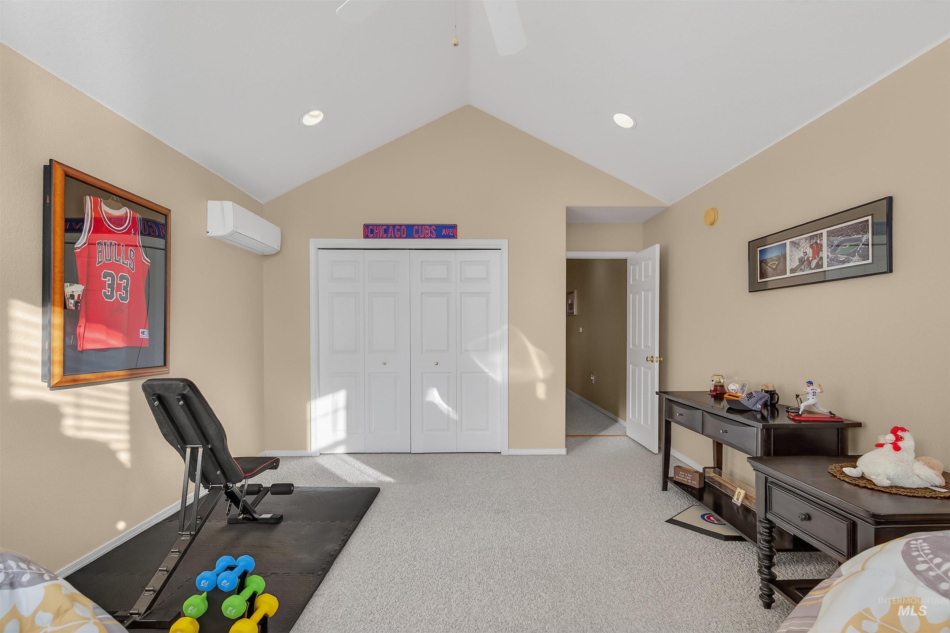 108 Tweedy Lane Kooskia, ID 83539 - Photo 37 of 48 Workout room with carpet, vaulted ceiling, and recessed lighting