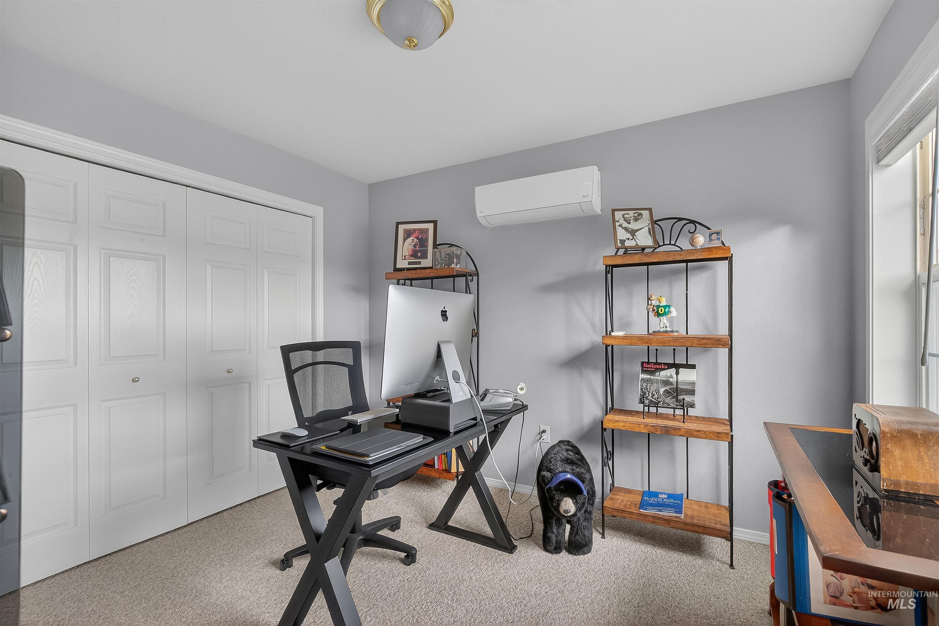 108 Tweedy Lane Kooskia, ID 83539 - Photo 38 of 48 Office space featuring light colored carpet and an AC wall unit