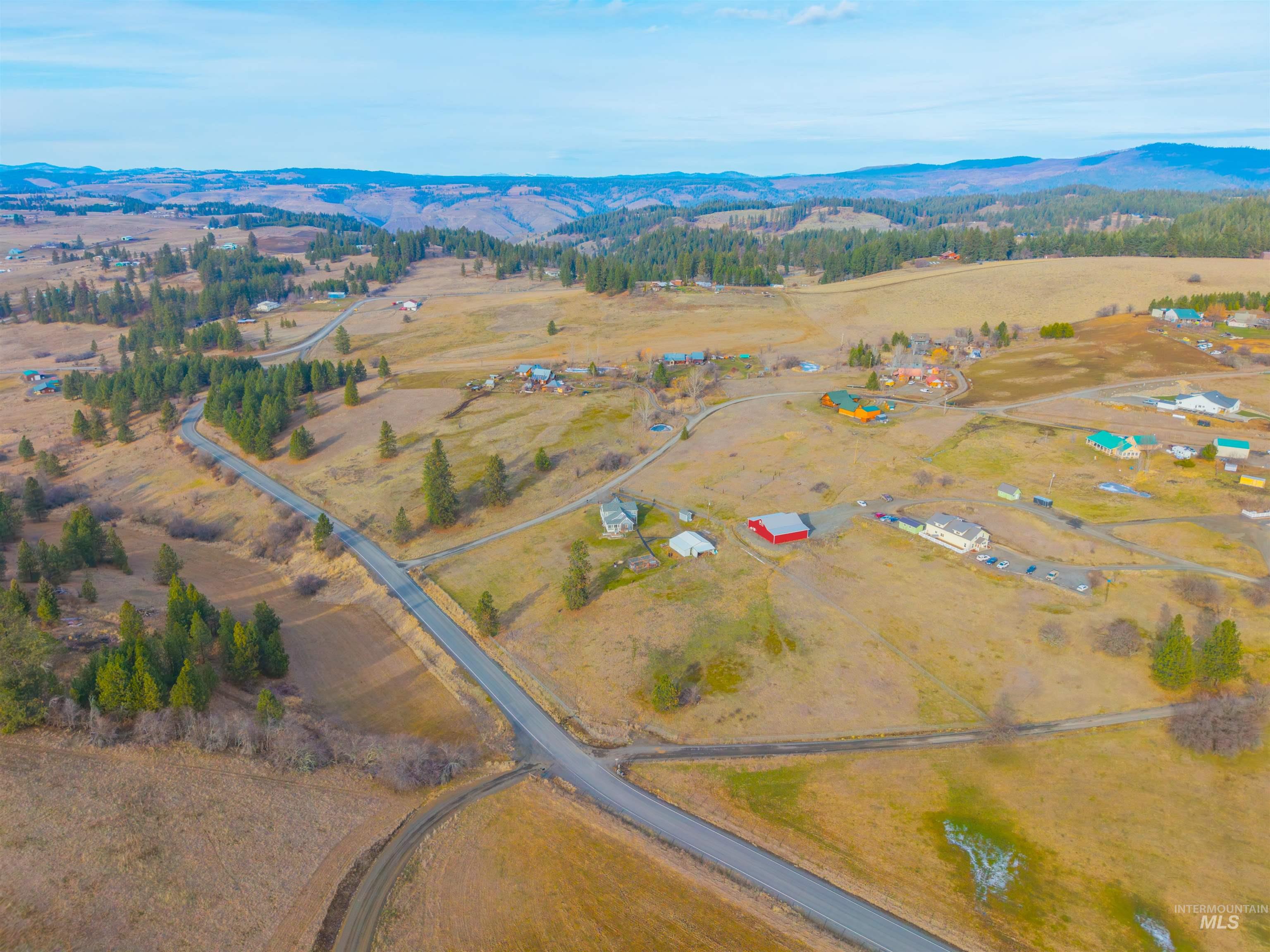108 Tweedy Lane Kooskia, ID 83539 - Photo 43 of 48 View of rural area featuring a mountain backdrop