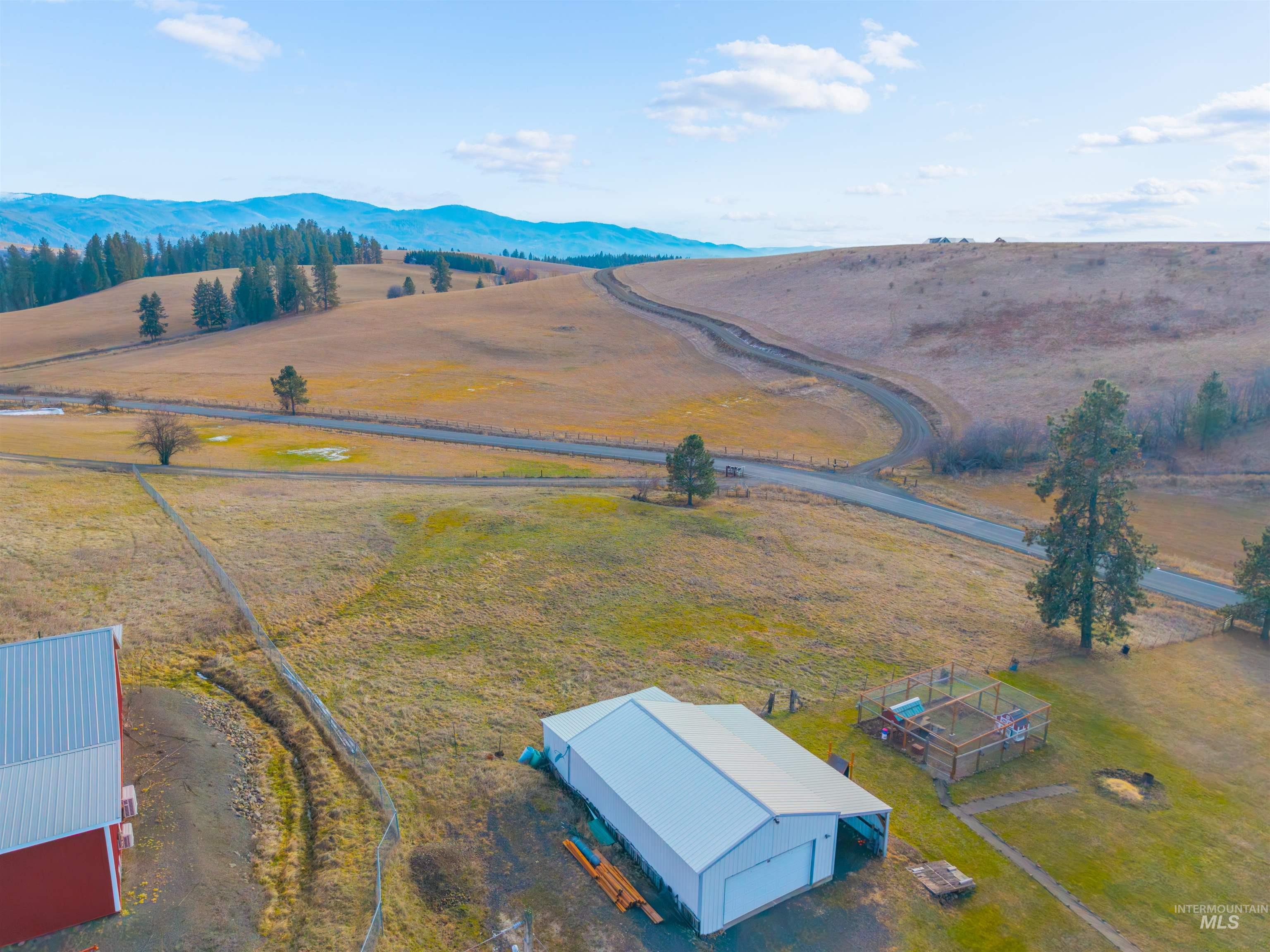 108 Tweedy Lane Kooskia, ID 83539 - Photo 45 of 48 Overview of rural landscape with a mountain backdrop