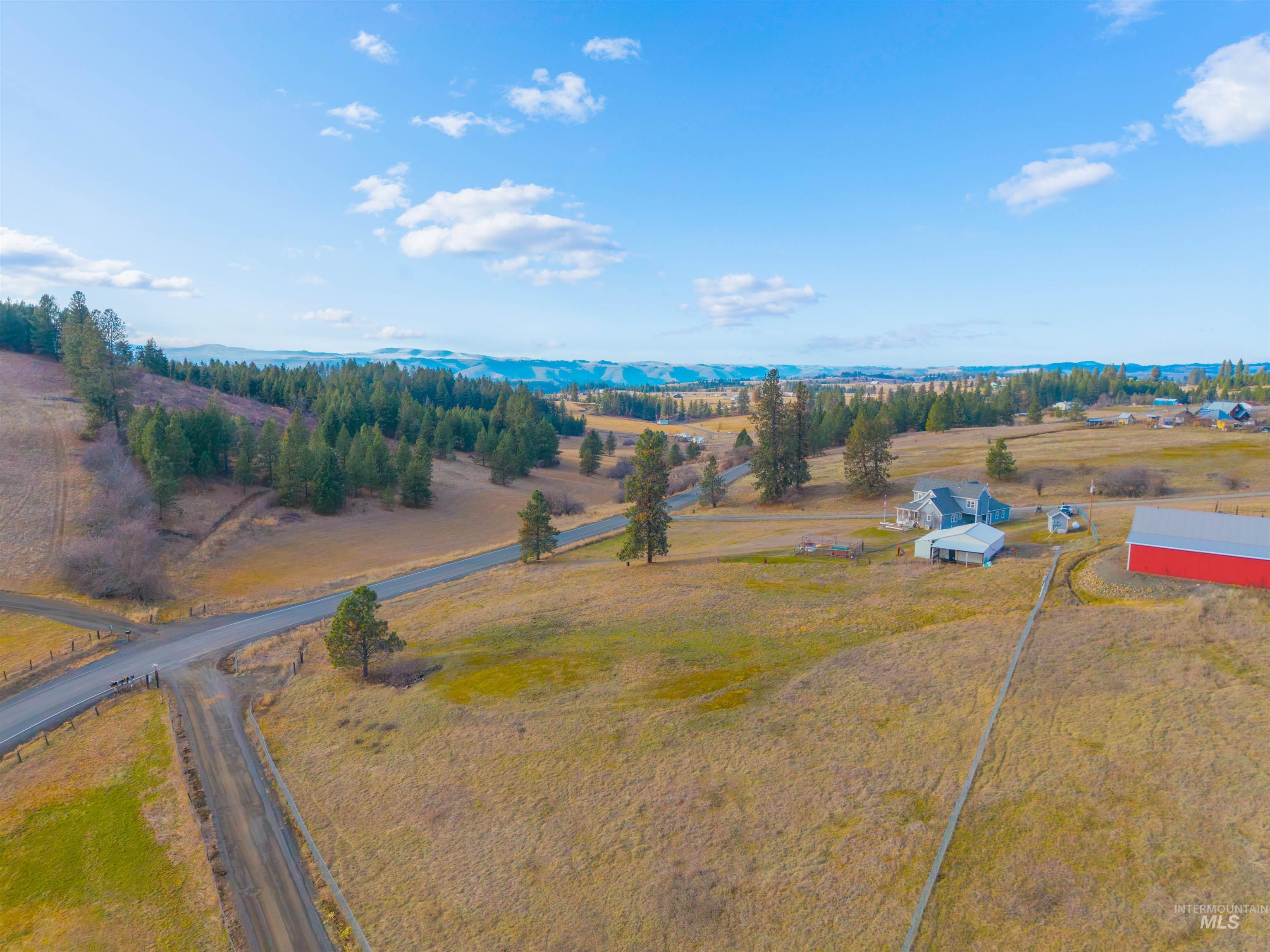 108 Tweedy Lane Kooskia, ID 83539 - Photo 47 of 48 Aerial view of sparsely populated area with mountains
