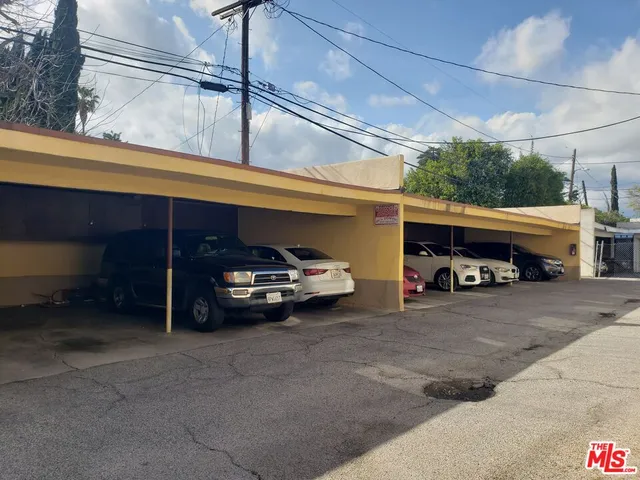 a view of parking garage with cars