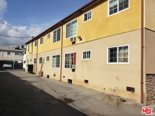 a view of a building with the street