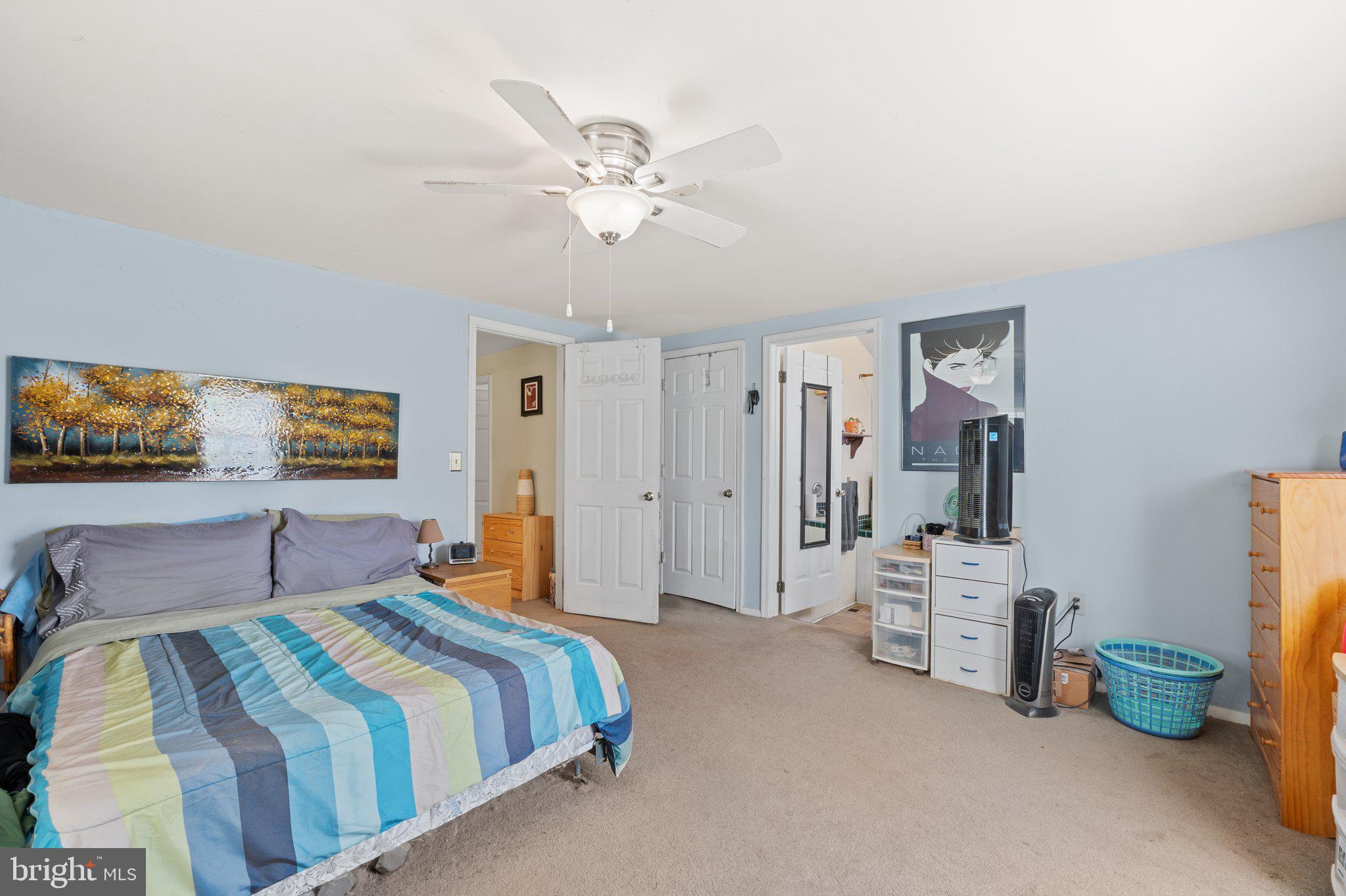 15921 Frederick Road Woodbine, MD 21797 - Photo 22 of 41 Serene bedroom with calming hues.