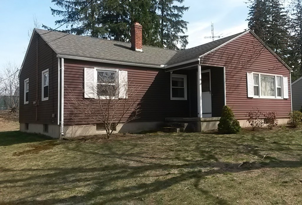 65 Timber Lane Springfield, MA 01119 - Photo 1 of 28 a view of a house with a yard
