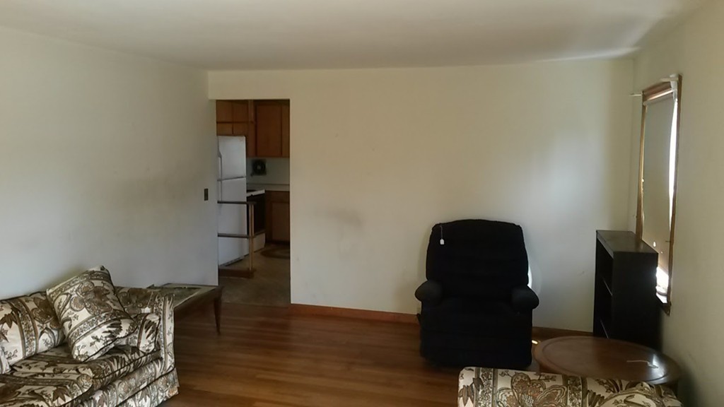 65 Timber Lane Springfield, MA 01119 - Photo 12 of 28 a living room with furniture and a wooden floor