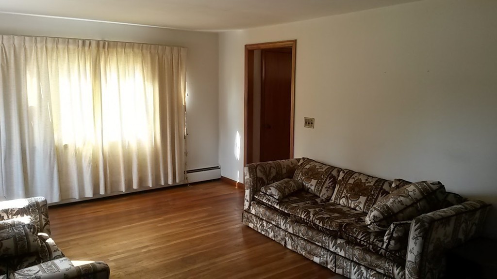 65 Timber Lane Springfield, MA 01119 - Photo 15 of 28 a living room with furniture and wooden floor