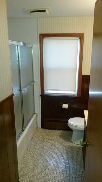 65 Timber Lane Springfield, MA 01119 - Photo 19 of 28 a bathroom with a sink a toilet and a mirror