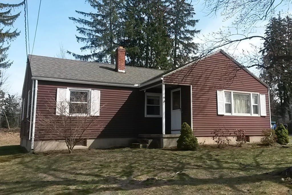 65 Timber Lane Springfield, MA 01119 - Photo 28 of 28 a front view of a house with a yard