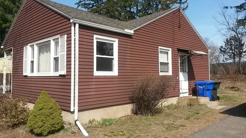 65 Timber Lane Springfield, MA 01119 - Photo 3 of 28 a view of a house with a yard