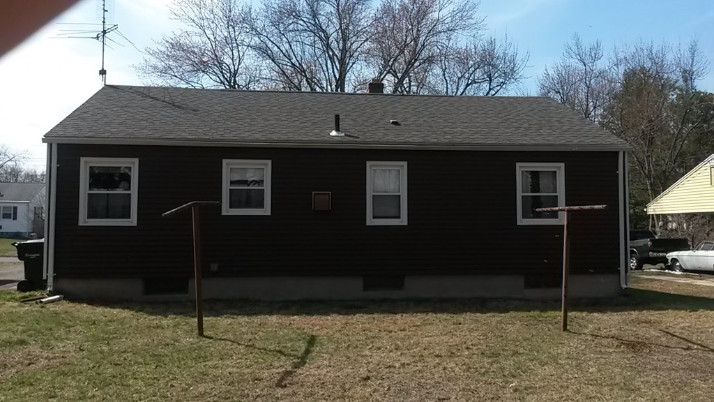 65 Timber Lane Springfield, MA 01119 - Photo 6 of 28 a backyard of a house