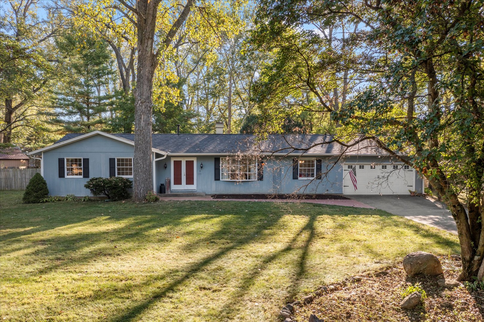 1108 Riverside Court Mahomet, IL 61853 - Photo 1 of 50 a front view of a house with a yard