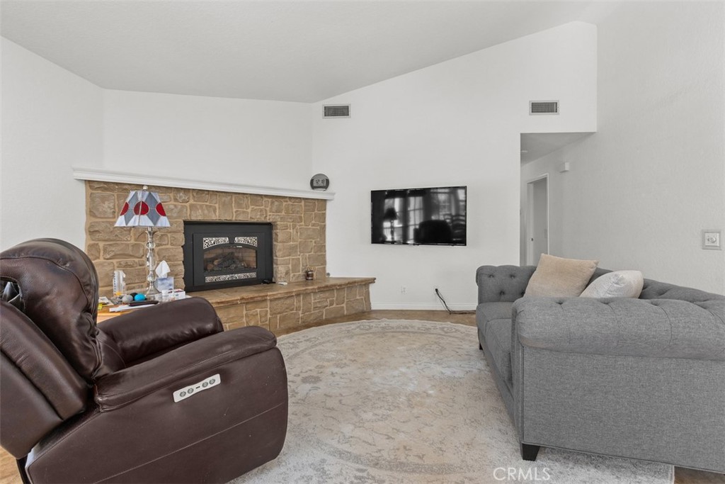 1765 Armadale Road Fallbrook, CA 92028 - Photo 12 of 45 a living room with furniture and a fireplace