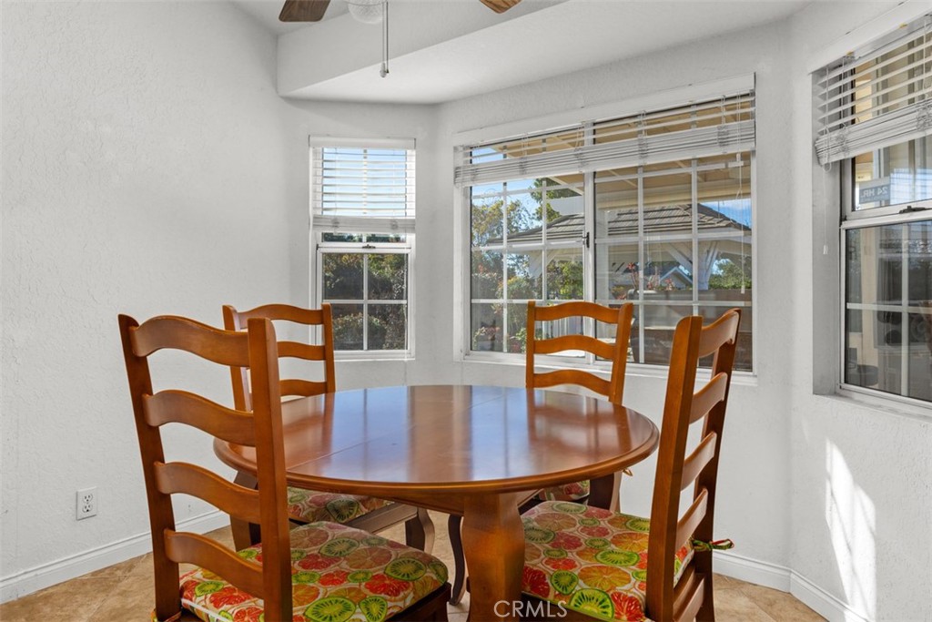 1765 Armadale Road Fallbrook, CA 92028 - Photo 19 of 45 a view of a dining room with furniture window and outside view