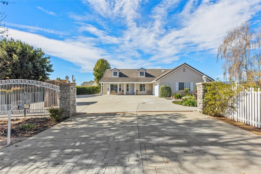 1765 Armadale Road Fallbrook, CA 92028 - Photo 2 of 45 a front view of a house with a yard