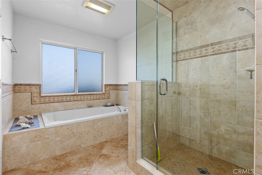 1765 Armadale Road Fallbrook, CA 92028 - Photo 29 of 45 a bathroom with a bathtub and a shower