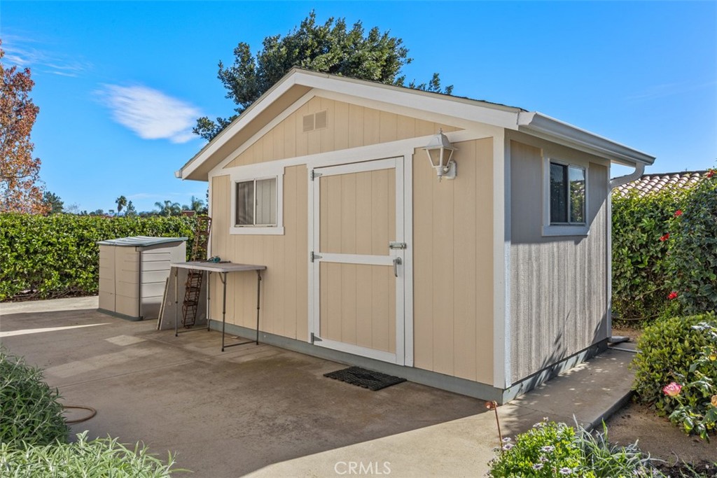 1765 Armadale Road Fallbrook, CA 92028 - Photo 30 of 45 a view of a house with backyard and garden