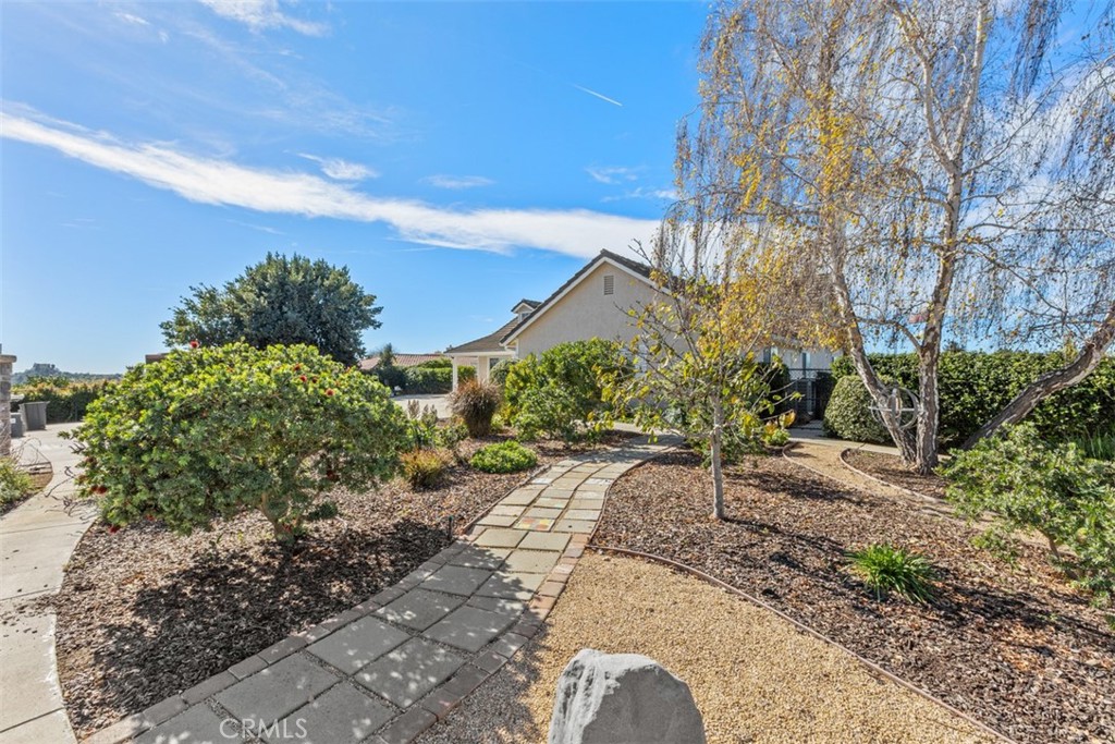 1765 Armadale Road Fallbrook, CA 92028 - Photo 5 of 45 a view of a garden with a pathway