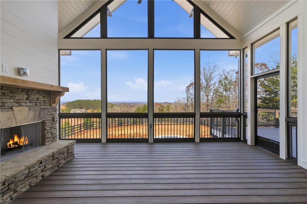 5364 Price Road Gainesville, GA 30506 - Photo 47 of 59 a view of a room with wooden floor and fireplace
