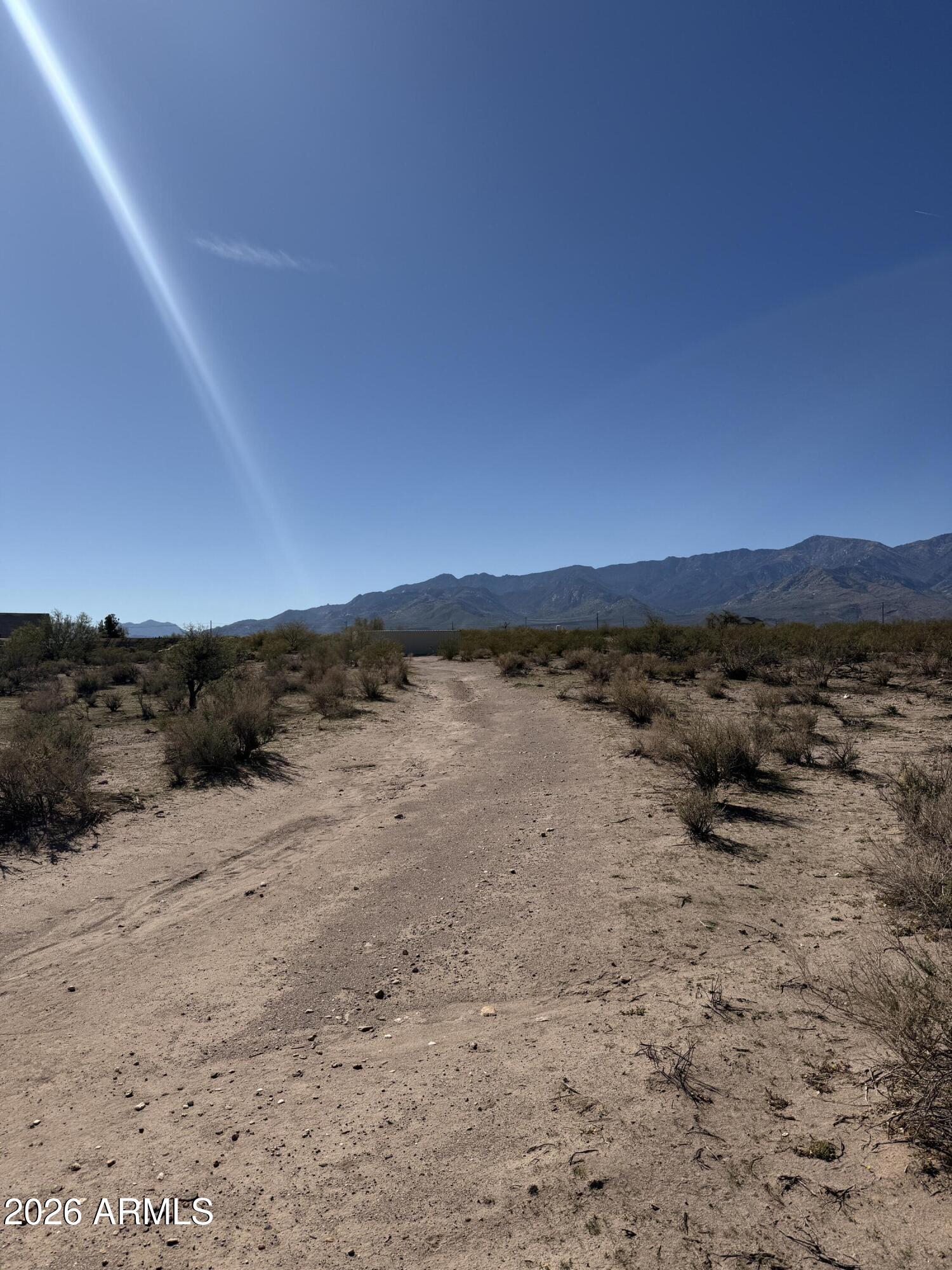 0 North Az-366 Trail Safford, AZ 85546 - Photo 1 of 5 a view of a lake with a mountain in the back