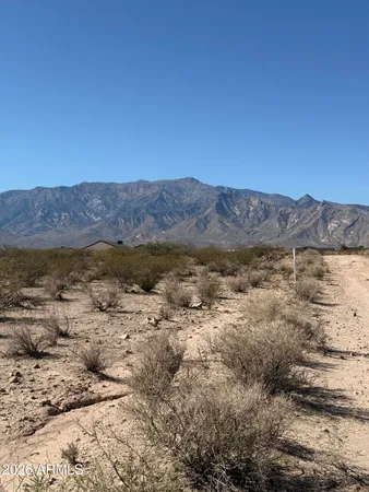 a view of mountains and valleys