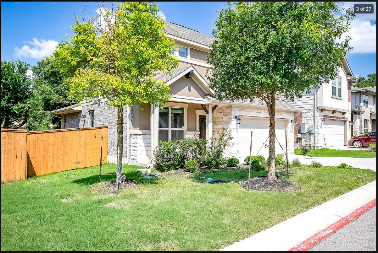 14215 McCoy Loop Austin, TX 78717 - Photo 3 of 27 Modern two-story residence with a tan stucco and light-colored stone facade